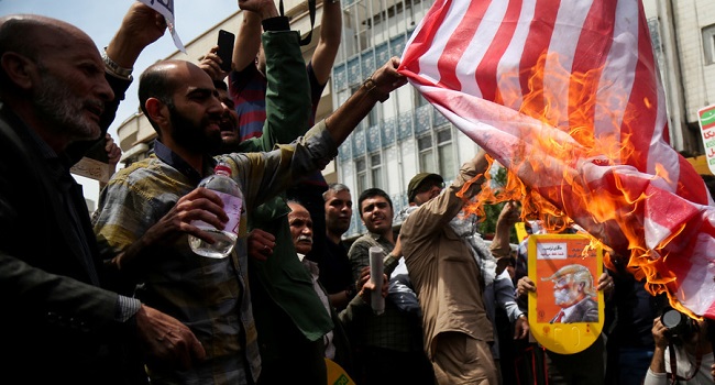 Iranians celebrate 40-yrs of Islamic revolution, burn US flags, chant death to Israel