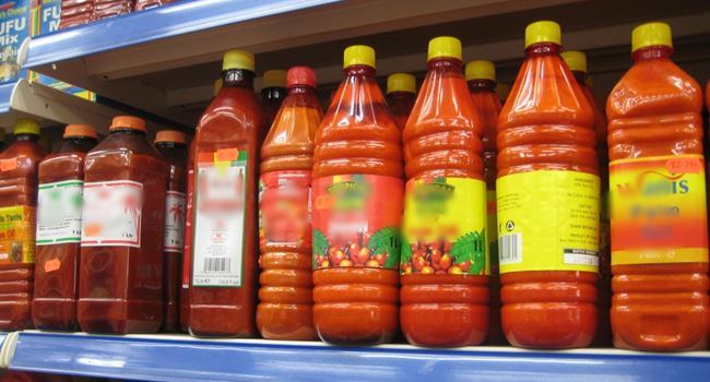 Buhari orders CBN to blacklist companies importing palm oil, 42 other items