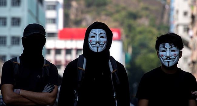 Hong Kong leader Lam wants to use colonial law to ban face masks as protests continue