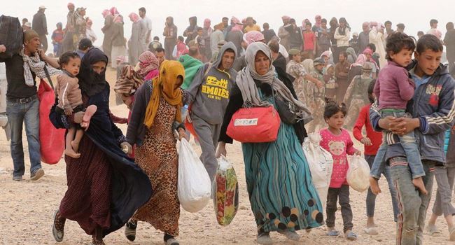 Thousands flee Syrian community as deadly bombings intensify