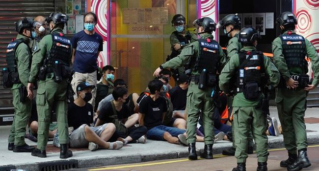 Hong Kong police arrest nine people suspected of helping residents detained by China