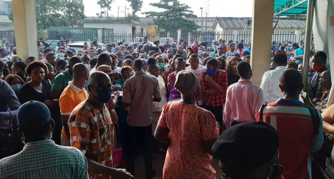 Lagosians ignore COVID-19 protocols, storm NIMC office in large number for NIN registration