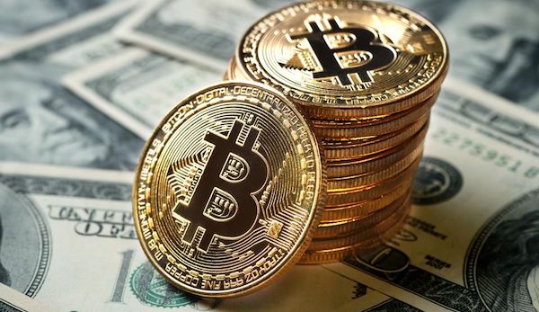 Bitcoin fails to maintain surge after hitting $50,000 mark