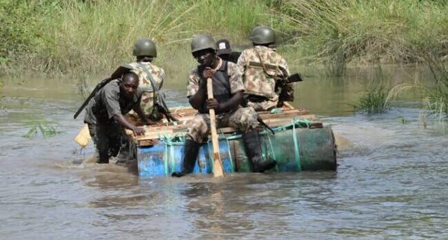 Nigerian soldiers on water