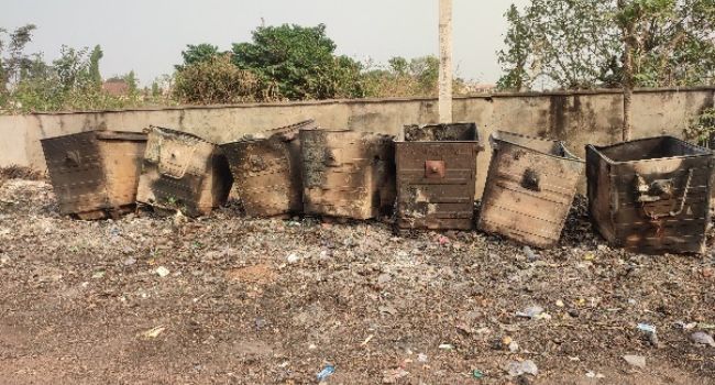 Burnt dumpsters at Independence Layout