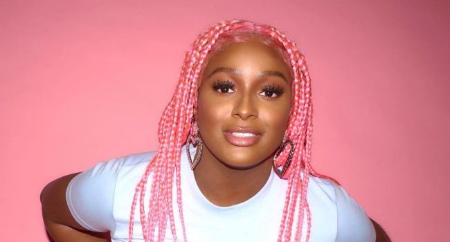 DJ Cuppy aims to be a better sister, unveils photo of autistic brother, Fewa Otedola
