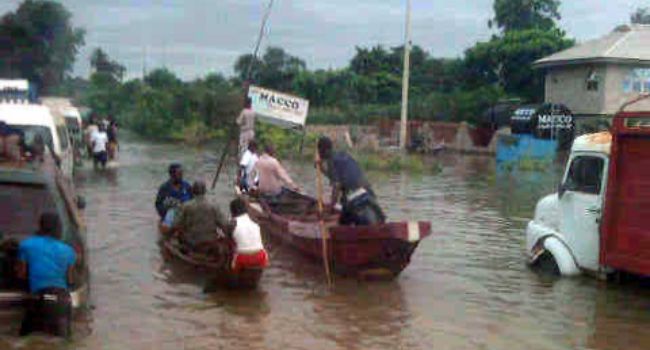 Stranded commuters resort to canoes as flood submerges Kogi capital